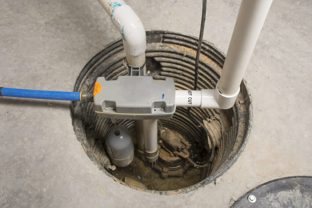 A sewage ejector pump installed in a basement of a home.